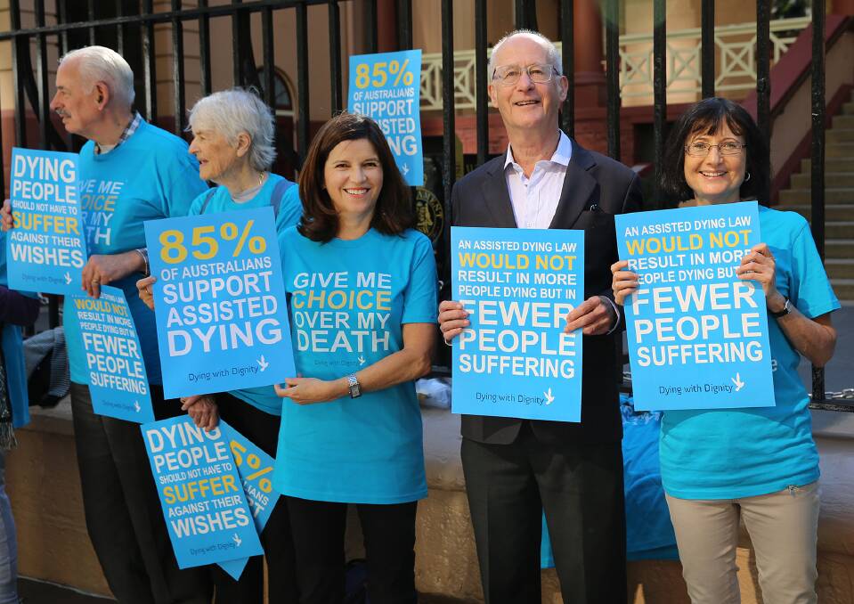 Strong message: Supporters of the NSW Voluntary Assisted Dying Bill, including Dying with Dignity NSW vice-president Shayne Higson, past president Richard Mills and president Dr Sarah Edelman, rally outside NSW Parliament on the morning of the debate.
