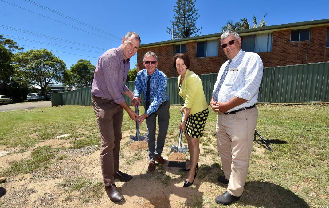 Project launch: Port Macquarie-Hastings mayor Peter Besseling, Garden Village general manager Tim Everson and Port Macquarie MP Leslie Williams turn the first sod for the development while Garden Village Board chairman Noel Atkins looks on.