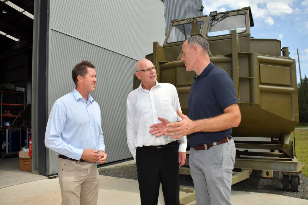 Opportunities: Cowper MP and Assistant Minister for Trade, Tourism and Investment Luke Hartsuyker,  NSW Senator Jim Molan and Birdon general manager Peter Besseling  talk about defence exports. Photo: Ivan Sajko