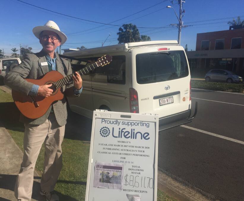 On the road: Classical guitar player Murray Mandel has reached Port Macquarie during his three-year fundraising tour. His classical guitar street performances are raising money for Lifeline.