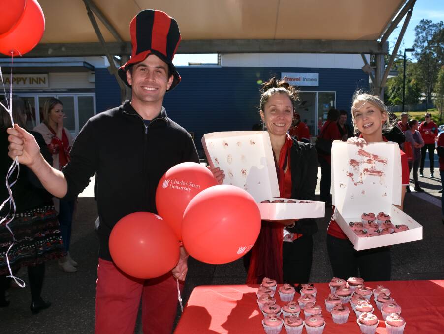 Celebrating CSU: Steve Watt, Clara Koch and Ruby Simmons get in the spirit of Foundation Day with a cupcake giveaway.