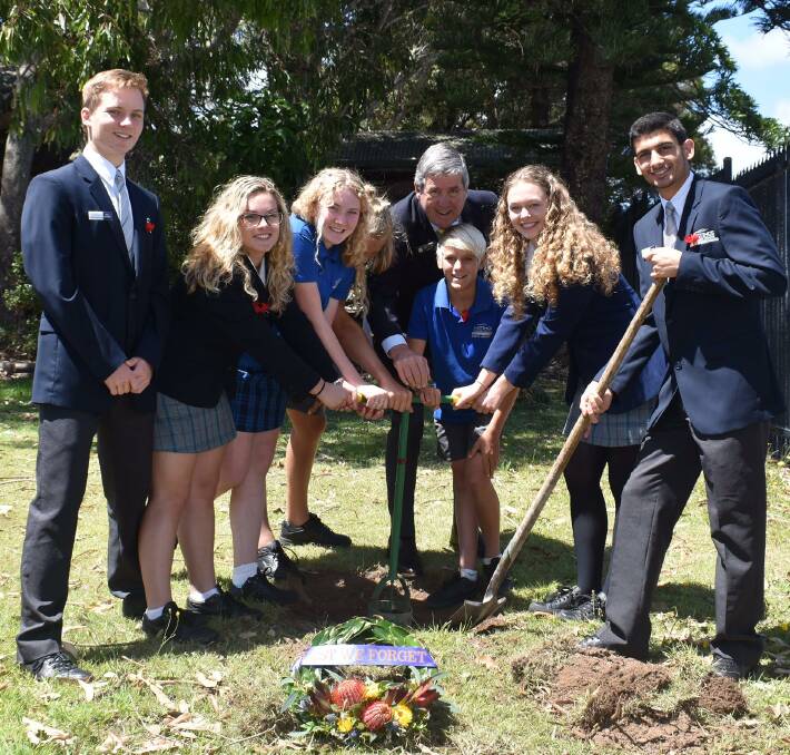 Meaningful connection with history: Blake Elliot, Tiegan Munro, Miah Noble, Greg Laird, Kayle Enfield, Tanisha Palmer and Samet Portakaldali collect the soil sample.