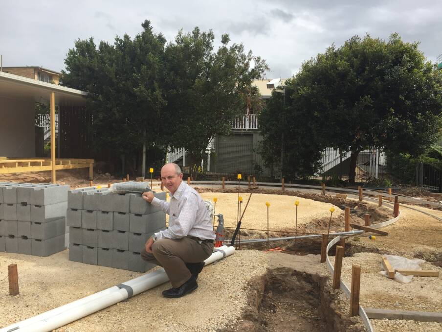 Garden project: Alzheimer's Australia NSW Mid-North Coast sector and capacity development – program manager Gary Thomas looks over the construction progress on the dementia friendly garden.