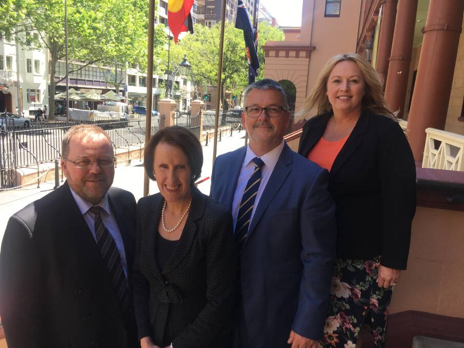 Working together: Port Macquarie-Hastings Council director of strategy and growth Jeffery Sharp, Port Macquarie MP Leslie Williams, council's general manager Craig Swift-McNair and mayor Peta Pinson at Parliament House for the ministerial meetings.