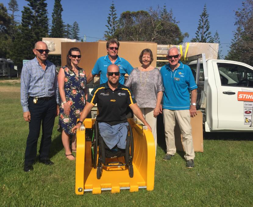Working together: (back) John Carroll, Pip Cullen, Peter Grob, Cr Lisa Intemann, Neil Black and (front) Ryley Batt support the Liberty Swing project.