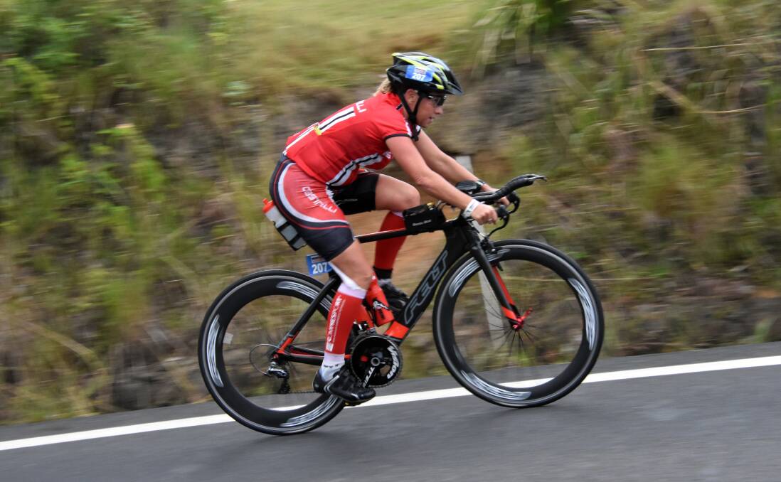 Up hill battle:?Port?Macquarie s Jodie Buttsworth in action on the bike on Sunday. Pic:?PETER?GLEESON