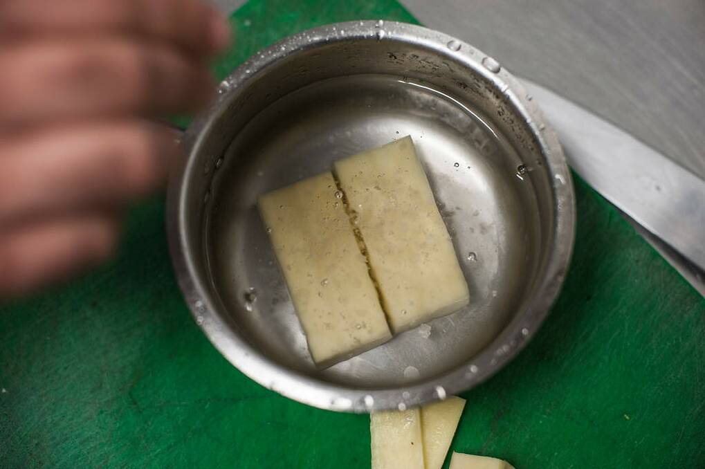 Step 2: After washing chips to remove starch, boil in a salted pan of water for 2 minutes or until just soft. Photo: Josh Robenstone/Getty Images