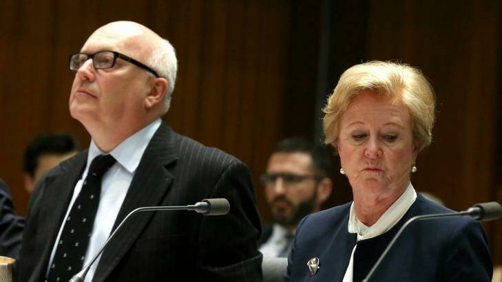 Unworkable: Attorney-General George Brandis and Professor Gillian Triggs appear before a parliamentary committee. Photo: Alex Ellinghausen