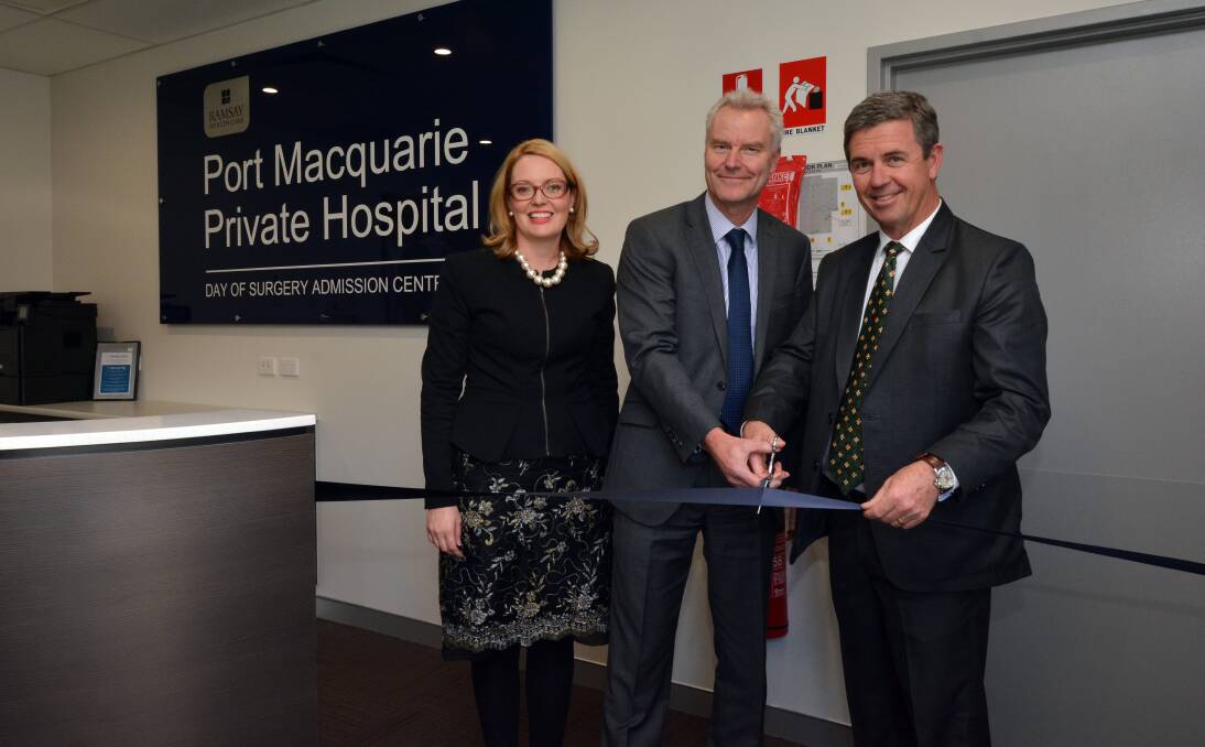 Milestone moment: Ramsay Health Care managing director and chief executive officer Chris Rex and Lyne MP Dr David Gillespie officially open the new operating theatres and day of surgery admission centre as Port Macquarie Private Hospital chief executive officer Connie Porter looks on.