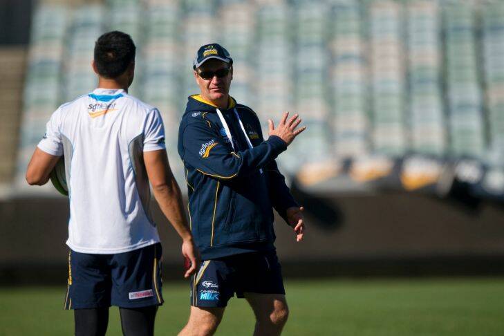 Sport
Christian Lealiifano and Wallabies kicking coach Damien Hill during the captains run training session at GIO Stadium.
The Canberra Times
30 May 2014
Photo Jay Cronan