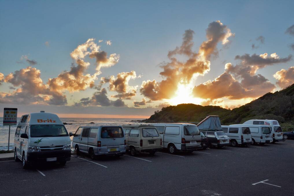 Happy campers: Several backpackers and tourists have set up shop at Shelley Beach, sleeping in their cars, tents and camper vans to avoid paying for accomodation.