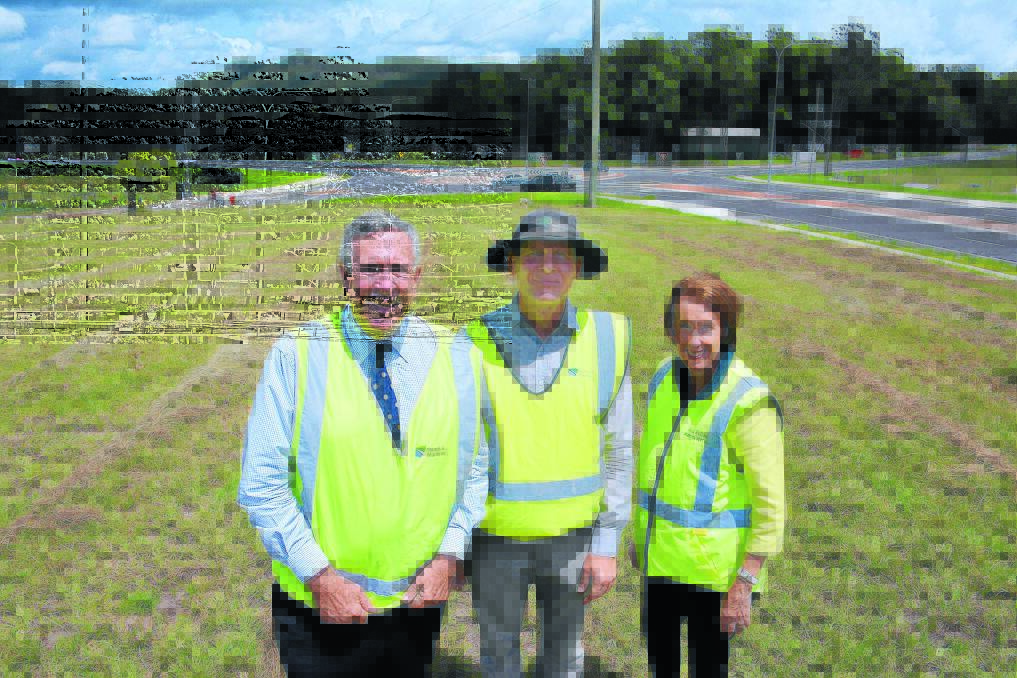 Improved intersection: Roads Minister Duncan Gay, Roads and Maritime Services project manager Pablo Aguilar and Port Macquarie MP Leslie Williams at the new Lake Cathie roundabout on Monday.