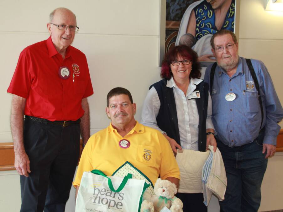 There is hope: Lions Club members, John Howley, from Port Macquarie, Stephen Perkins, Wauchope, and Zone 5 chairman Neil Tubb with Sister Sharon Eadie.