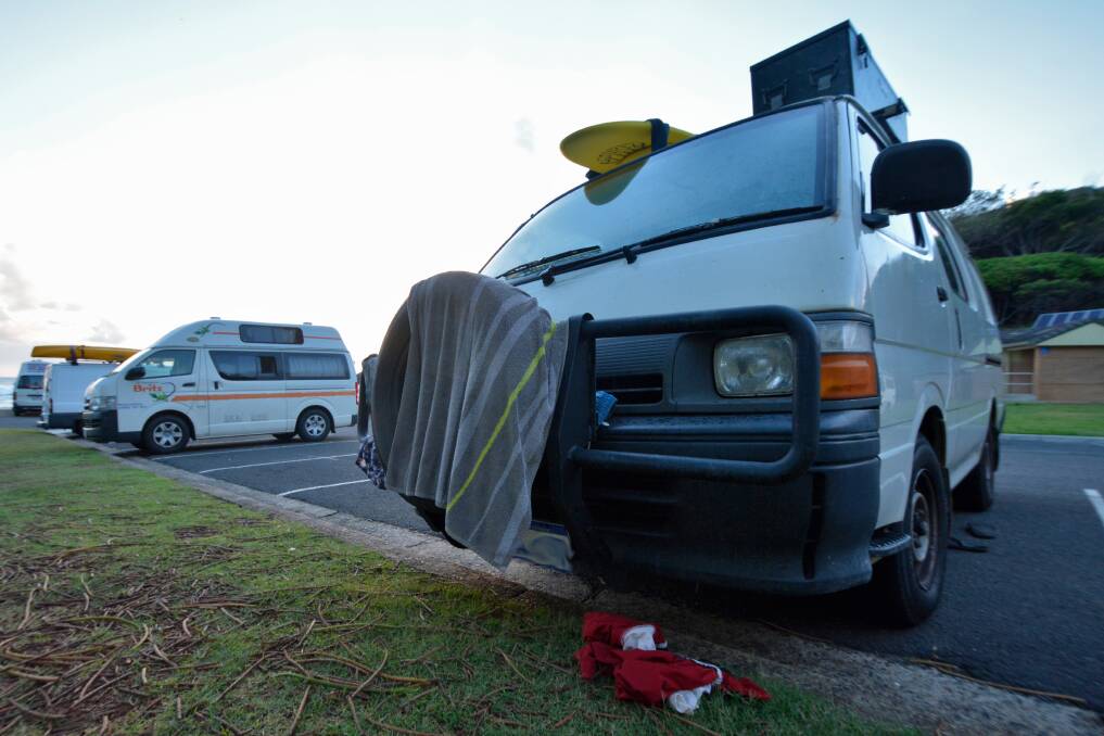 Happy campers: Several backpackers and tourists have set up shop at Shelly Beach, sleeping in their cars, tents and camper vans to avoid paying for accomodation.