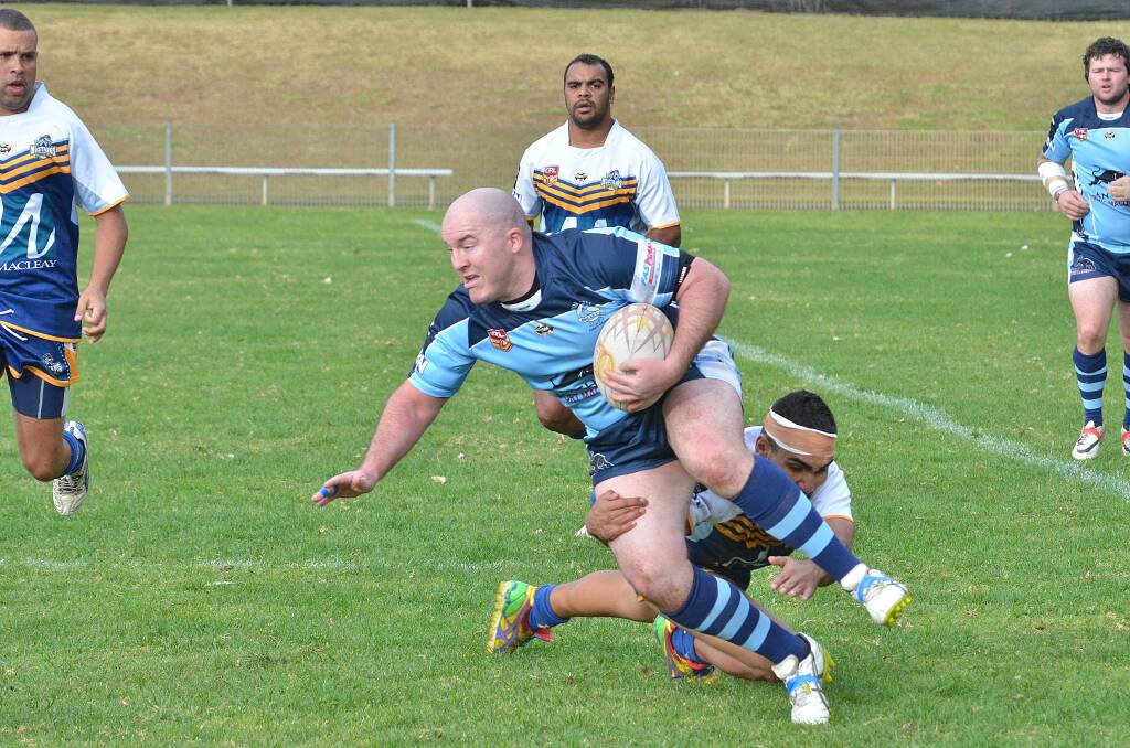 Down again: Luke Ackroyd with the ball for the Port City Breakers in another difficult loss.  
Pic:?NIGEL?McNEIL