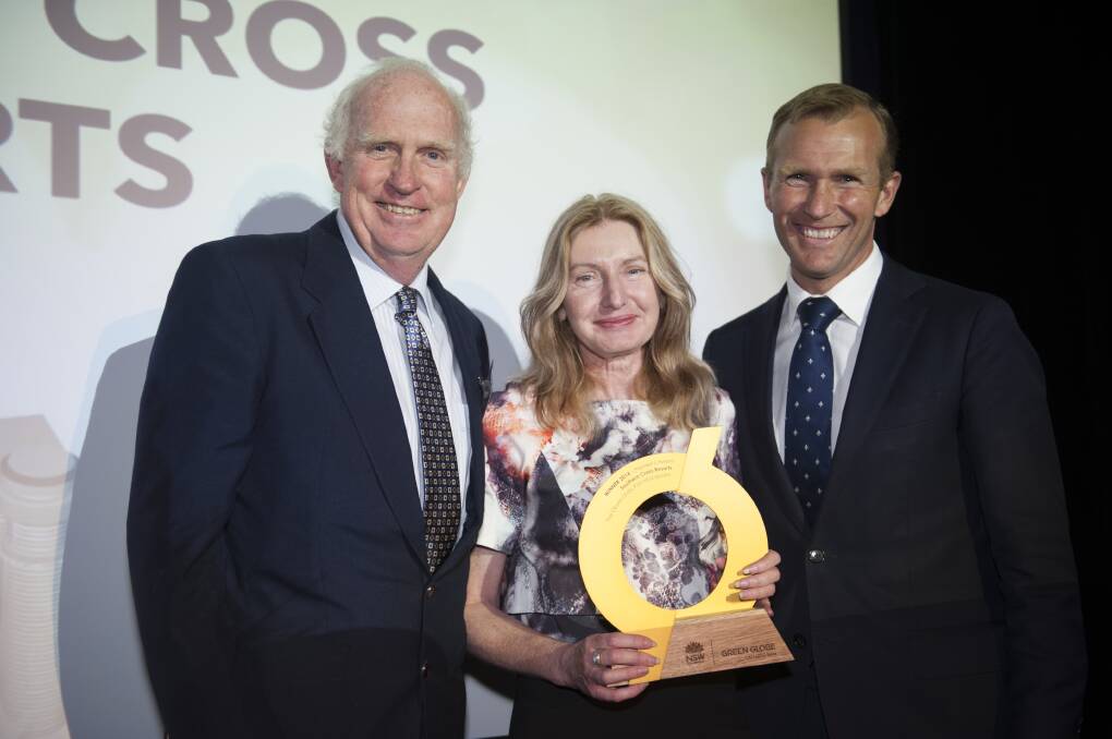 Gold among the Greens: Environment Minister Rob Stokes presents the best of the best gold Green Globes Award to The Observatory s Chris and Trish Denny.