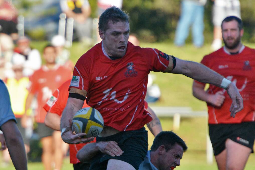 Captain with the ball: Chris Geary in action for Pirates last weekend. 				Pic: MATT ATTARD