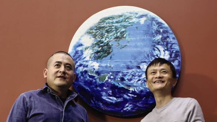 "We have created an earth": Zeng Fanghi and Jack Ma (right) pose in front of their painting. Photo: Sotheby's