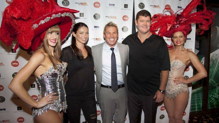 Shane Warne with Erica Baxter and James Packer at one of his charity's poker events at Crown Casino.