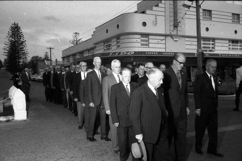 Dawn service: A group of returned service men leave the dawn service at the war memorial to march back to the RSL Club in Short Street, 1964.