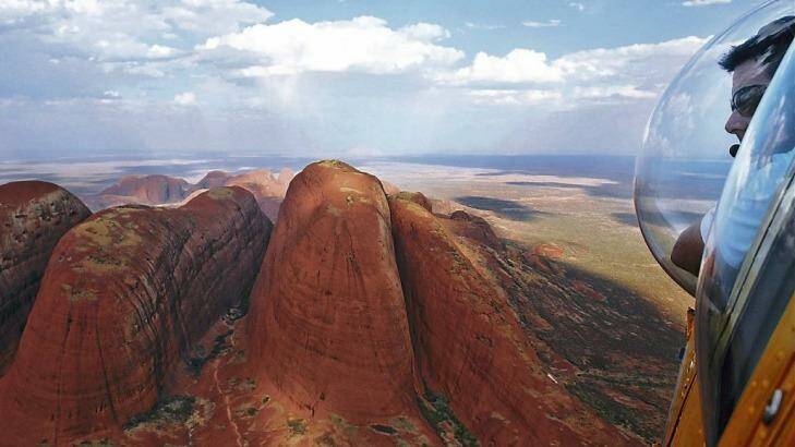 PHS helicopter tours over Uluru and Kata Tjuta offer spectacular views. Photo: Supplied