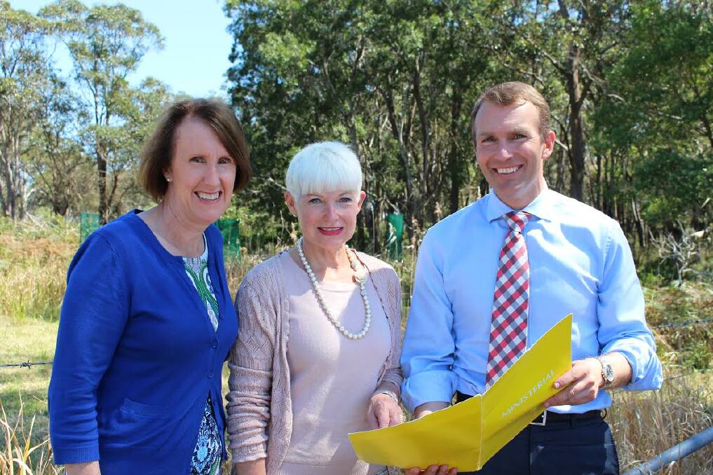 Working together: Port Macquarie MP Leslie Williams, Mid North Coast Regional Organisation of Councils chair Cr Liz Campbell and Environment Minister Rob Stokes discuss funding to help with contaminated land management.