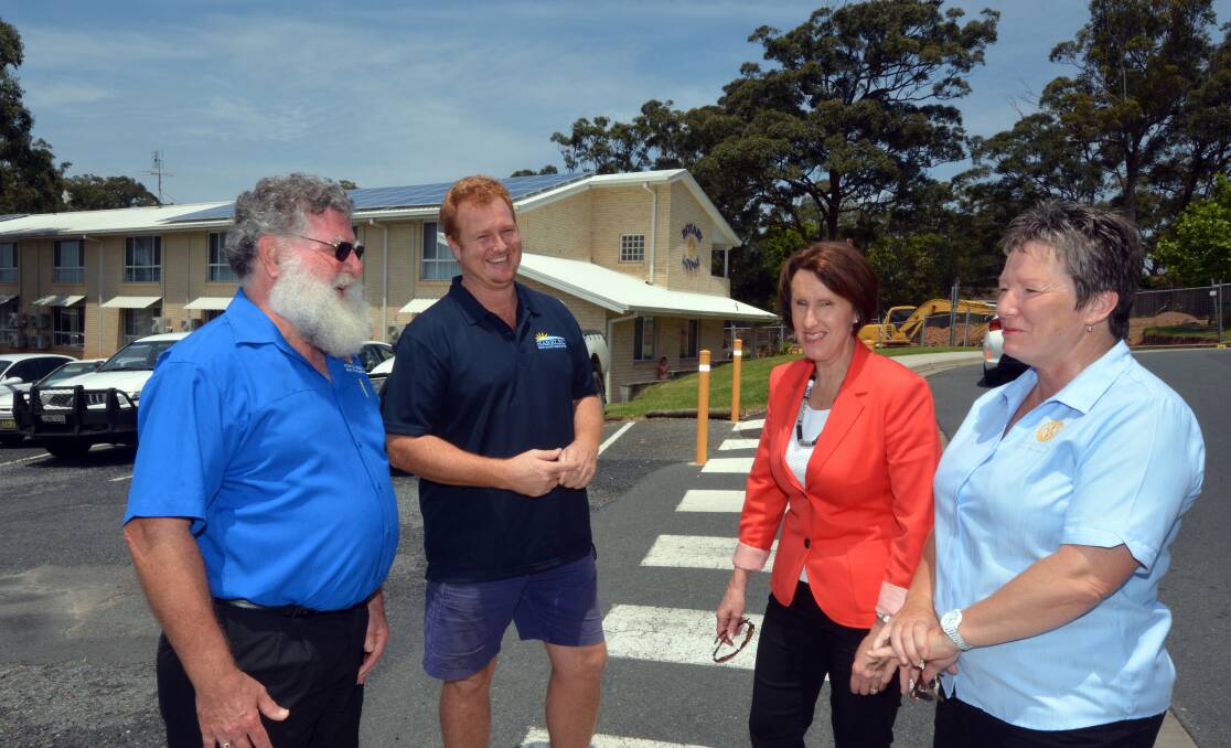 Community focus: Rotary Lodge chairman Phil Hafey, Harelec's Jamie Harrison, Port Macquarie MP Leslie Williams and Rotary Lodge manager Paula Johnson recognise the value of the solar panels.