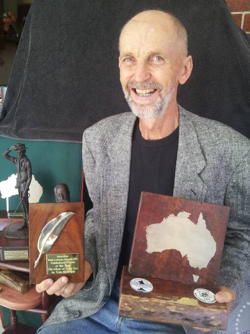 Sitting pretty: Tom McIlveen with his trophies from this year's Australian Bush Laureate and Australian Bush Poetry Championships awards.