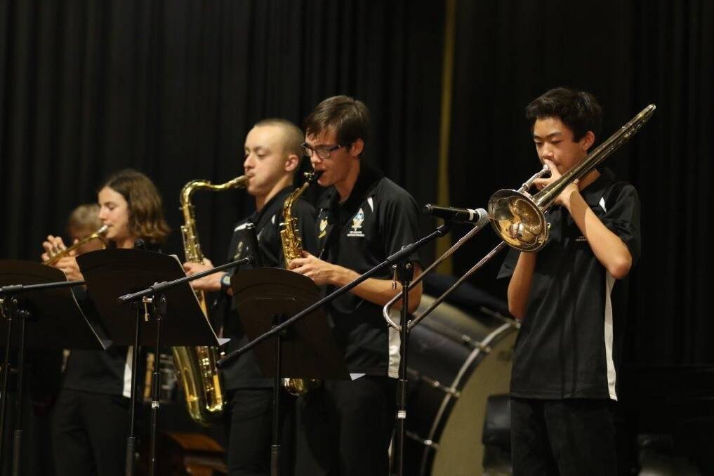 Big sound: MacKillop College The Big Band - students from years 8 to 10, who play jazz standards, swing and funk and rehearse once a week before school. The college's Little Band will also play at the Glasshouse podium for Friday's CMNC lunchtime concert at 12.30pm