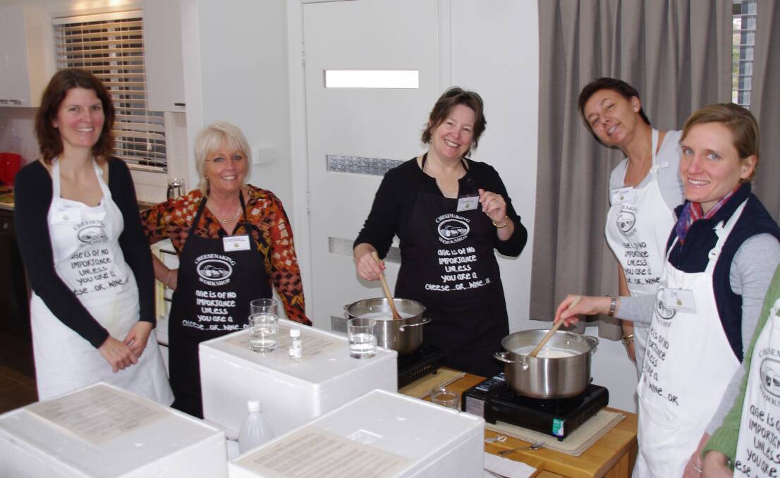 Budding cheesemakers: Lyndall Dykes, second from left, with participants at one of her popular cheese making workshops.