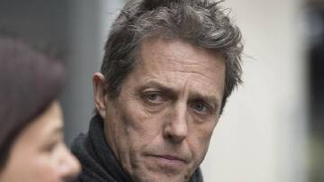 Hugh Grant sued News Group Newspapers for alleged widespread unlawful information gathering. (AP PHOTO)