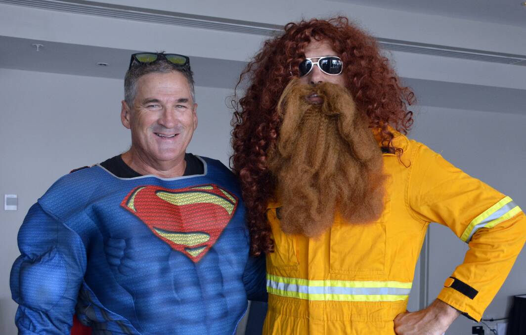 Incognito: Superman and Captain Risky, aka Steve Cherry and mayor Peter Besseling before agree it was a great thing to do for the Westpac Rescue Helicopter Service.