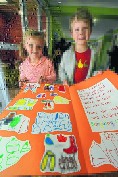 Winter appeal: Lainey Fenton and Thomas Newman from Bangalay Childcare Centre.