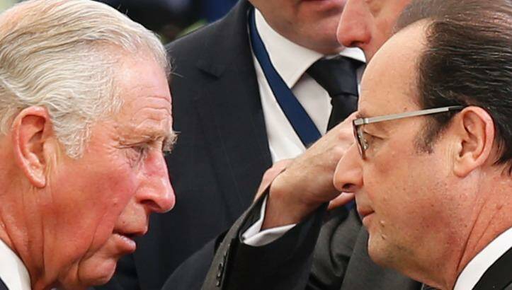 Britain's Prince Charles, left, and French President Francois Hollande talk prior to the funeral. Photo: ARIEL SCHALIT