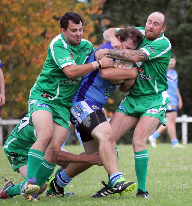 Solid: Logan Marshall and Jamie Trotter wrap up a Kendall player in defence on Saturday.