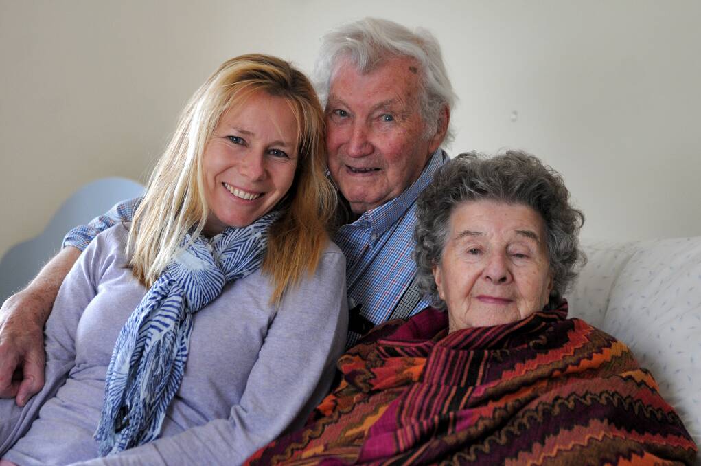 Worry free: Nicole Gillan with grandparents Dennis and Irene Turner who are now in an aged care home
