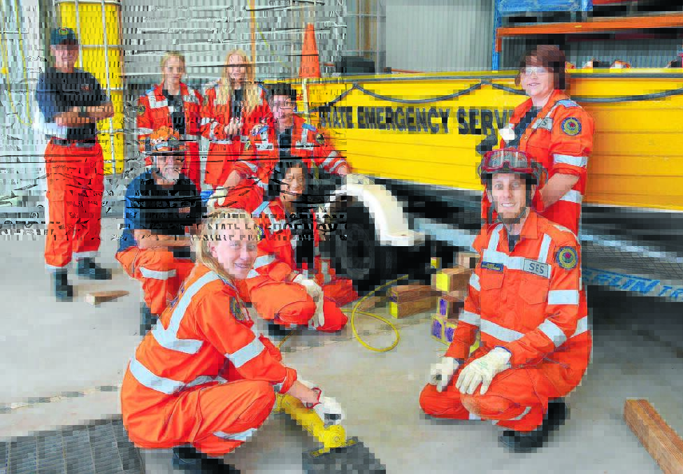Practical business: front; Caitlin Dewberry, Christopher Dowse - SES, Amber Shuttleworth, back; Don Roach - SES, Neil Lipscombe - SES, Dakota Cartright, Nicole O'Donnell, Lochie Johnston and Patricia Asunciou learned about rescues in floods.