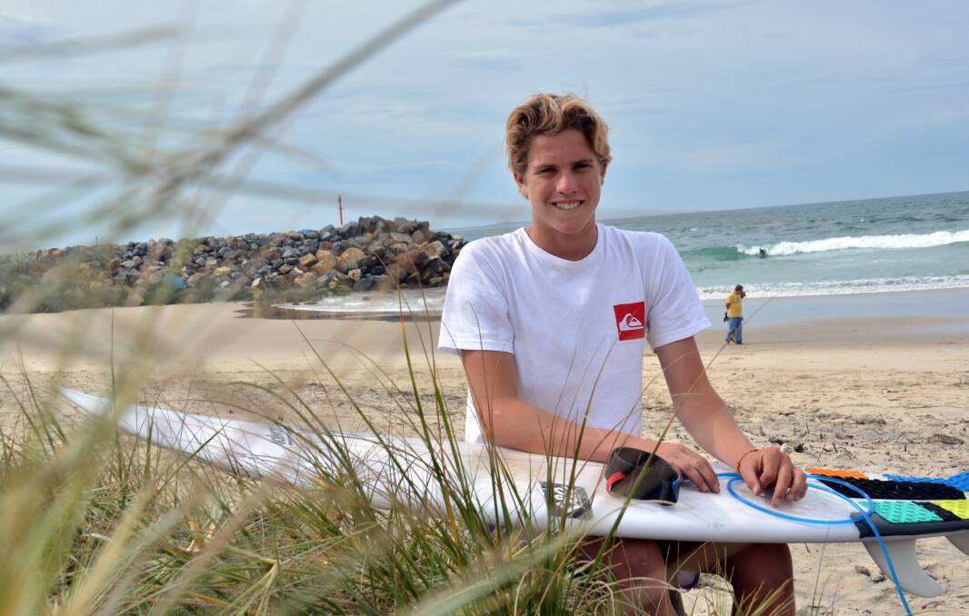 Flying the flag: Surfer Ben Howard will hit the waves at Newcastle tomorrow.