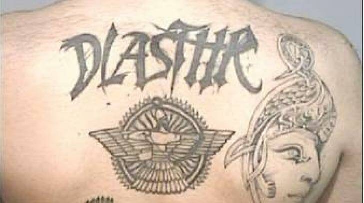 A DLASTHR gang member tattoo. 