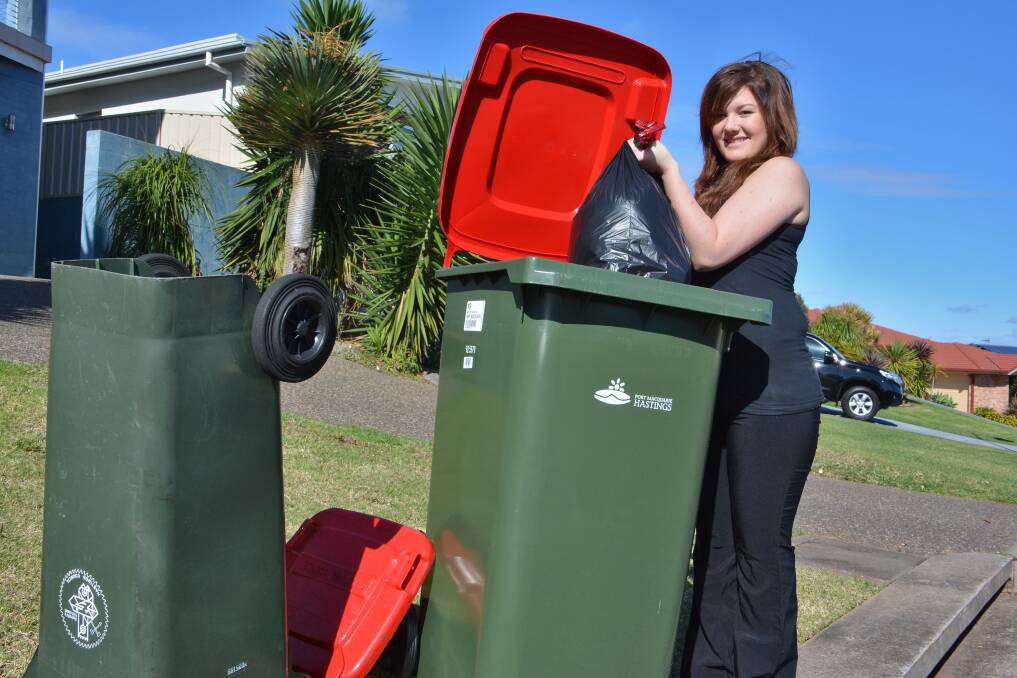 Bin ready: Lauren Felton with new and old red bins.