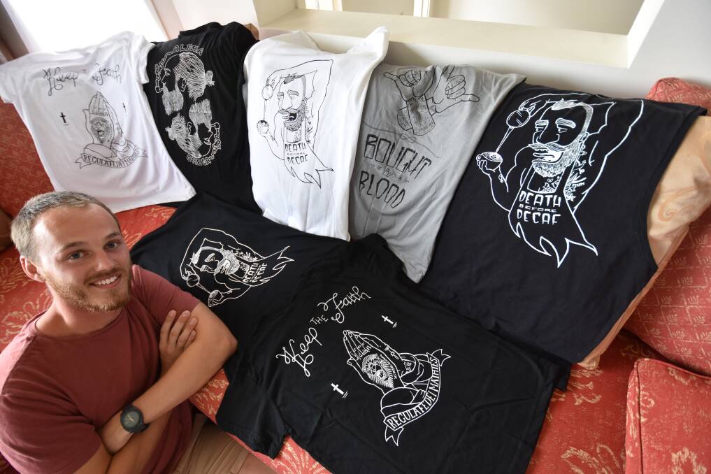 Ethical choice: Mike Peereboom shows off his YHWH Clothing T-shirt designs.
