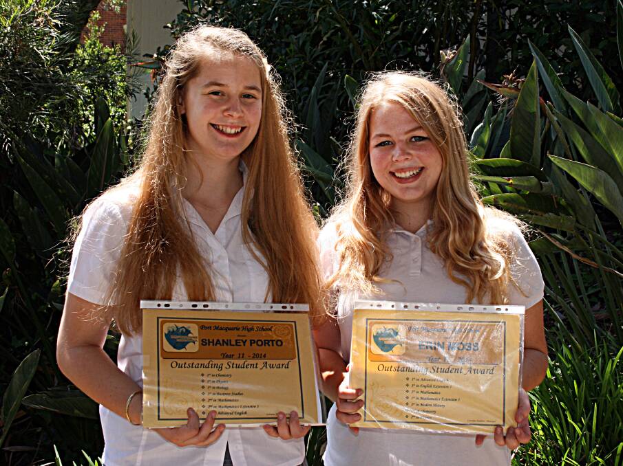 LEFT: Outstanding: Year 11 students Shanley Porto and Erin Moss tied as the most outstanding students for 2014 after coming either first or second in each of their subjects.