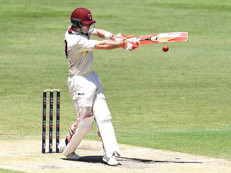 Queensland's Jimmy Peirson is the top scorer after three innings in the match against Tasmania.