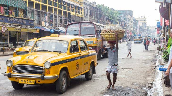 The ubiquitous yellow taxi in a Kolkata street. Photo: iStock