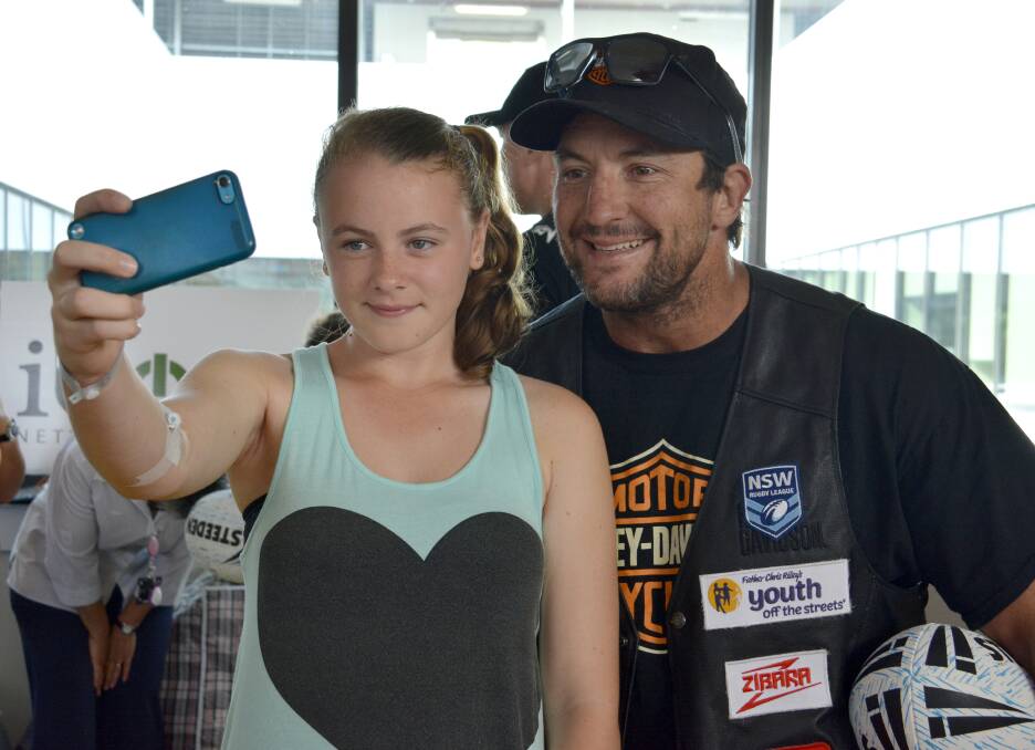 Memorable moment: Chloe Sills gets a selfie with Nathan Hindmarsh.