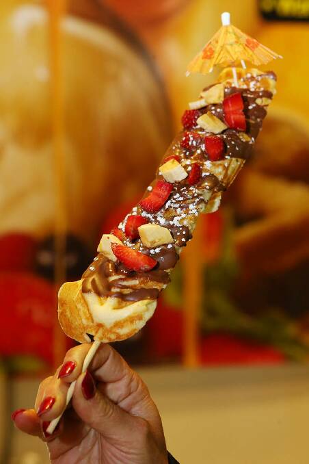 Tutti fruity: Chocolate-dipped waffle on a stick. Photo: Chris Hyde