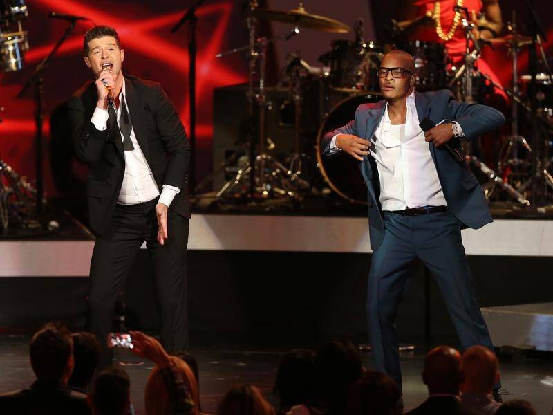 A court's ruled that Robin Thicke (left) ripped off a Marvin Gaye song for their hit Blurred Lines.