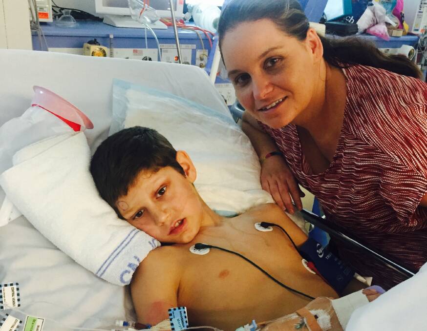 Courageous Caleb: With mum Suzanne at the Sydney Children's Hospital before surgery.