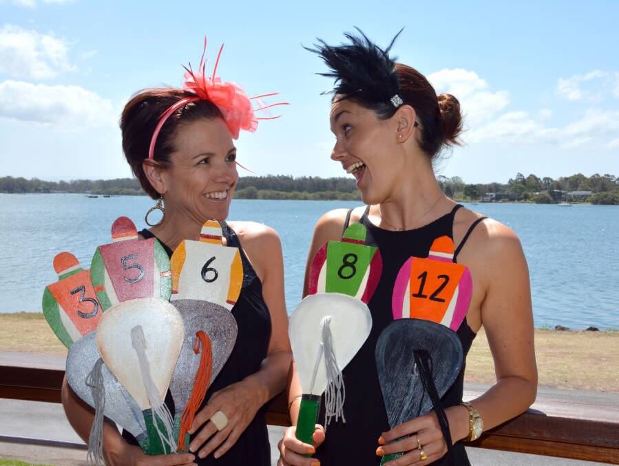 Centrepieces with a difference: Organisers Jo Turnbull and Tamara Grieves are all set for Tuesday's Melbourne Cup luncheon at Port City Bowling Club.