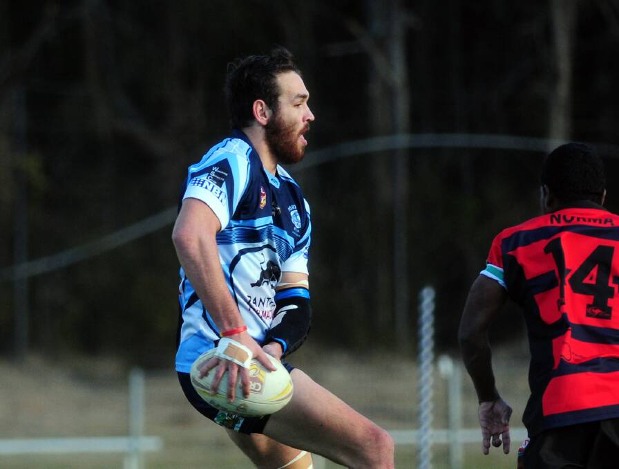 Looking for a pass: Tom Dooker in action for the Breakers against Old Bar. He and his Port City teammates will take on Wauchope Blues on Sunday in the major semi final.